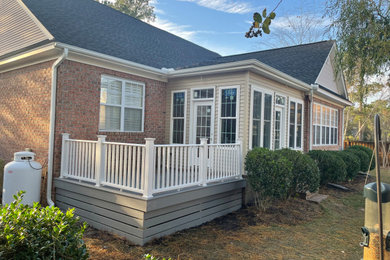 Example of an arts and crafts deck design in Other