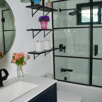 Classic black and white bath room with pattern play