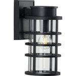 Progress Lighting - Port Royal Collection 1-Light Small Wall Lantern with DURASHIELD - This wall lantern distills both industrial and artisan influences with its signature ribbed black frame constructed from durable corrosion-resistant, composite polymer. Inside the cage rests an elongated, clear glass shade that adds to the light fixture's modern flair. The design's blend of industrial and coastal inspiration makes it a perfect light fixture for updating your favorite spaces in and around your home. DURASHIELD by Progress Lighting is built to last. Constructed from a composite material with UV protection, DURASHIELD holds up even in the harshest weather conditions. This high-performance finish has a 5-year warranty and is resistant to rust, corrosion, and fading.