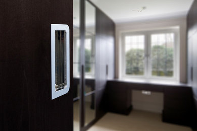 This is an example of a small contemporary guest bedroom in London.