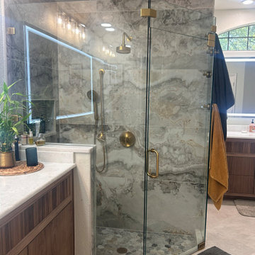 Frameless shower with wand