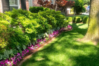 This is an example of a farmhouse landscaping in Other.