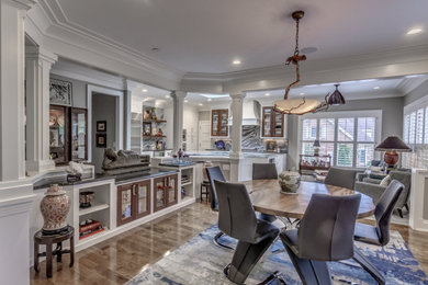 Example of a large eclectic gray floor kitchen/dining room combo design in St Louis