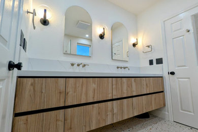 Bathroom - mid-sized modern kids' white tile and ceramic tile double-sink bathroom idea in San Francisco with flat-panel cabinets, light wood cabinets, marble countertops, white countertops and a floating vanity