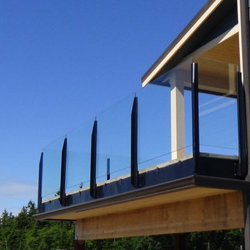 Paver deck with glass railing