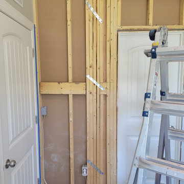 Load bearing wall pocket door