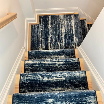 Stair runner installation on basement stairs