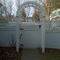 Stained White Arbor with square lattice sides and Fairfield with Square Lattice - Home Fencing And Gates