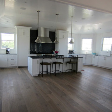 MONTAUK: WIDE PLANK ENGINEERED INSTALLED/WHITE OAK INSTALLED/FINISHED IN BEDRMS