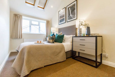 This is an example of a contemporary bedroom in Buckinghamshire.