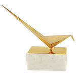 Harp and Finial - Bird Statue I Gold Finish on Metal with White Marble Base - With a gold bird figurine atop a white marble base, the Bird Statue I is an intriguing sculpture sure to be the focal point of contemporary decor. The sleek, simple lines of the metal bird are reminiscent of origami, and the metallic gold finish is a stunning counterpoint to the bright white color of the horizontal rectangular marble base. This avian tabletop sculpture makes a radiant addition to a family room, living room, or foyer.
