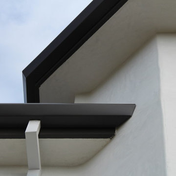 6 inch Angle Face/Flat Face Gutters with smooth Downspouts in Pacific Palisades