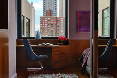 Example of an eclectic bedroom design in New York