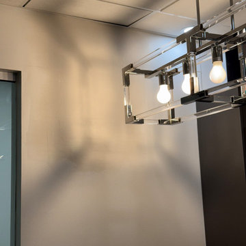 Drywall repair above a reception desk in Vancouver