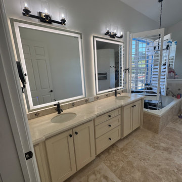 Curd-less walk-in shower; heated floors in bathroom + shower+bench LED