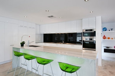 Mid-sized modern u-shaped open plan kitchen in Perth with a double-bowl sink, flat-panel cabinets, white cabinets, granite benchtops, black splashback, glass sheet splashback, stainless steel appliances, marble floors and with island.