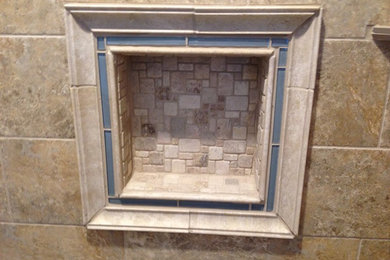 Large transitional master beige tile and stone tile ceramic tile alcove shower photo in Cleveland