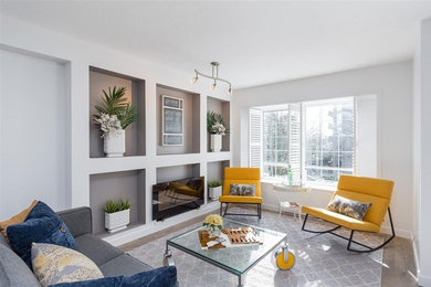 This is an example of a small contemporary formal open plan living room in Vancouver with white walls, a ribbon fireplace, a metal fireplace surround, no tv, grey floors and medium hardwood flooring.