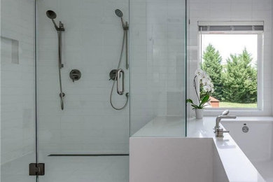 Example of a mid-sized 1950s master white tile and ceramic tile ceramic tile, gray floor and double-sink bathroom design in Dallas with flat-panel cabinets, a two-piece toilet, white walls, an undermount sink, quartz countertops, a hinged shower door, white countertops and a floating vanity
