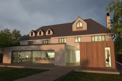 This is an example of an expansive contemporary detached house in West Midlands with three floors, mixed cladding, a pitched roof, a tiled roof and board and batten cladding.