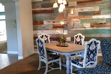 Example of a beach style dining room design in Other