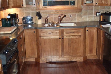 Example of an arts and crafts kitchen design in Boston