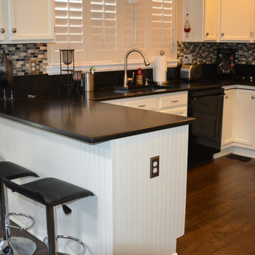 Australian Black Leathered Granite with Mosaic Back Splash