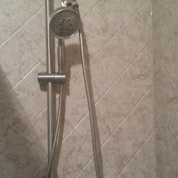 Brecchia embossed shower wall close up