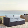 Crosley Furniture Biscayne Rattan & Fabric Patio Loveseat in Brown and Mist Blue