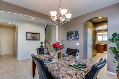 Inspiration for a mid-sized timeless ceramic tile and beige floor enclosed dining room remodel in Phoenix with gray walls and no fireplace