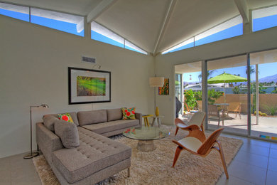 Example of a mid-sized minimalist open concept and formal ceramic tile and beige floor living room design in Other with no tv, white walls and no fireplace