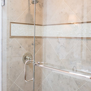 Transitional Bath with River Rock Accents