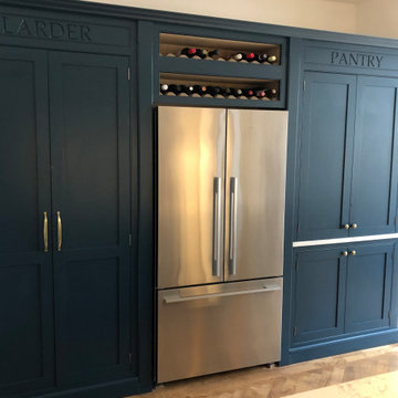 Stunning classic dark blue kitchen with a cafe style feel