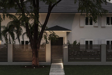 Example of a transitional exterior home design in Miami