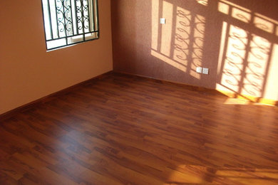 Example of a trendy home design design in Other