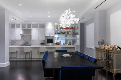 Inspiration for a huge contemporary dark wood floor, black floor and coffered ceiling great room remodel in New York with gray walls
