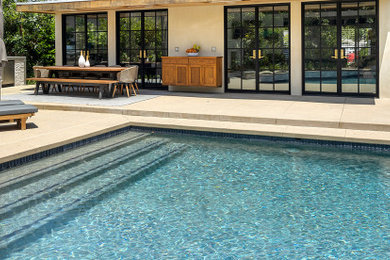 Trendy pool photo in Orange County