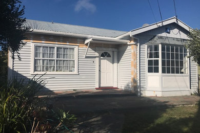 This is an example of a medium sized traditional home in Wellington.