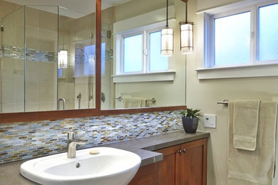 Bathroom - small craftsman master multicolored tile porcelain tile bathroom idea in San Francisco with shaker cabinets, dark wood cabinets, quartz countertops and beige walls