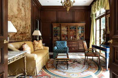 Inspiration for a mid-sized timeless formal and enclosed wall paneling living room remodel in Atlanta with brown walls