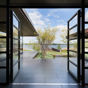 Lac La Belle - Modern Brick Lake Home with Dock and Boathouse