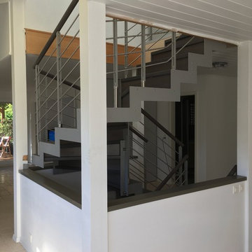 escalier tournant sur 2 étages avec contre-marches bois et acier