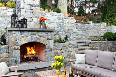 Inspiration for a timeless patio remodel in DC Metro with a fire pit