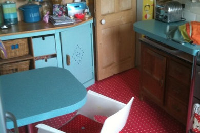 This is an example of an eclectic kitchen in London.