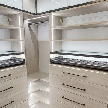 Luxurious Walk-In closet with LED lighting and glass sliding doors