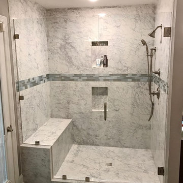 Frameless shower glass with benches