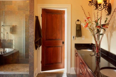 Inspiration for a modern multicolored tile and stone tile slate floor bathroom remodel in Nashville with yellow walls