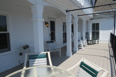 Inspiration for a large timeless balcony remodel in Boston with no cover