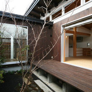 他の地域のアジアンスタイルのおしゃれなデッキ (日よけなし) の写真