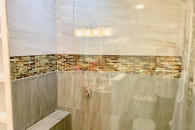 Mid-sized trendy master beige tile and porcelain tile bathroom photo in Other